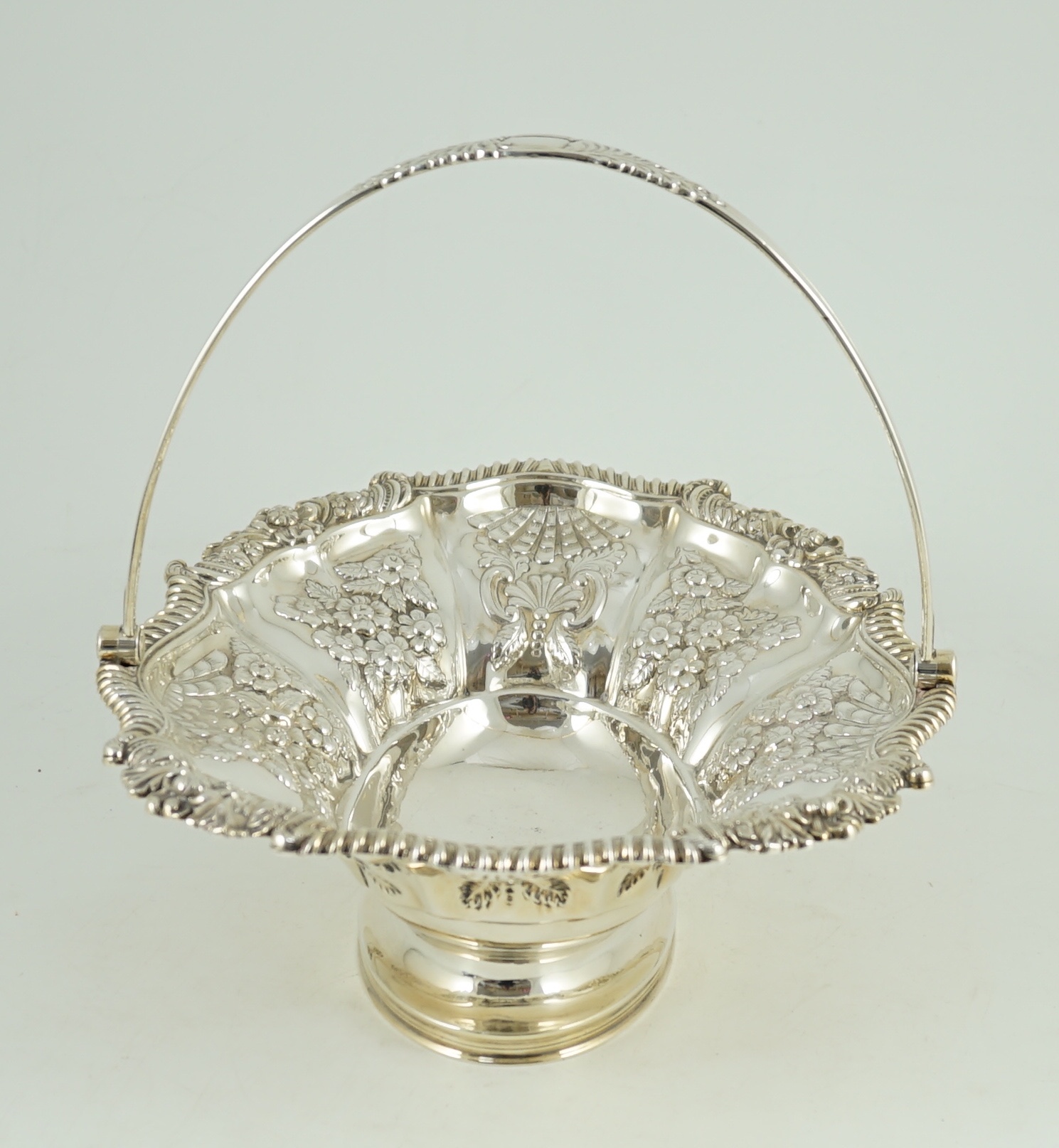 A late George III silver oval cake basket, by Kirby, Waterhouse & Co